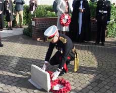 Lieutenant General Sir Robert Fulton KBE laying wreath at Gosport War Memorial