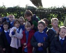 School children line the route of the Parade